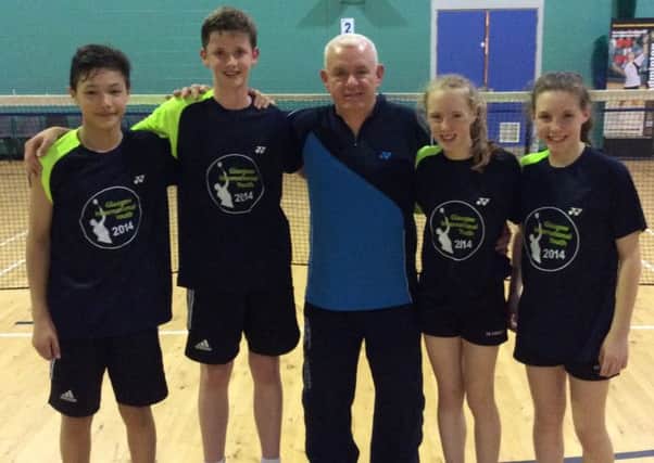 Trevor Woods with daughters Rachael and Rebecca and doubles partners James Penver and Rory Easton in Team Skyfall.