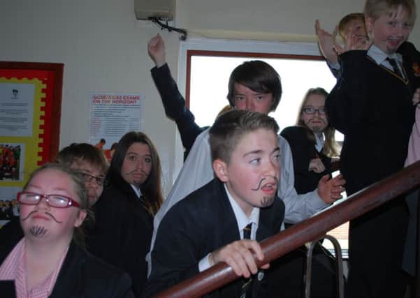 Pupils sneak about the school
