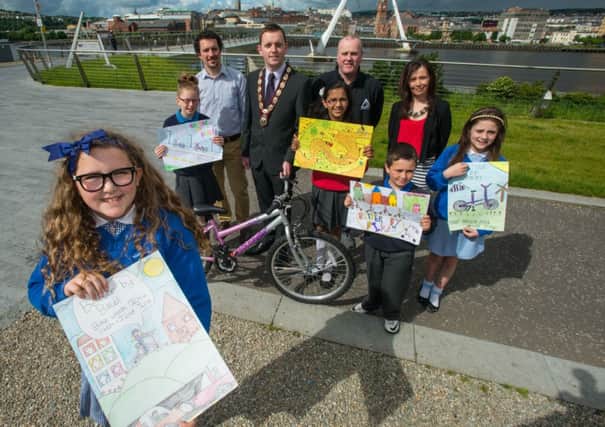 The winner (Mia Shearring of Nazareth House PS) and runners up of the Bike Week P6 poster competition were all smiles as they joined the Deputy Mayor, Alderman Gary Middleton to launch this years Bike Week festival.  Also in picture are Ross McGill of Sustrans, Brian Cassidy of Claudy Cycles, and Denise McCallion of the Public Health Agency.