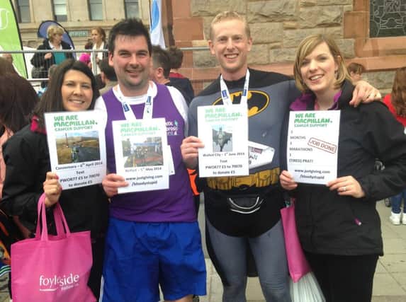 Mission accomplished: Pictured (l-r) at the finish line of the Walled City Marathon in Guildhall Square are Amber Porter, Charles Porter, Alan Dew and Kathy Dew. INNT 24-503CON