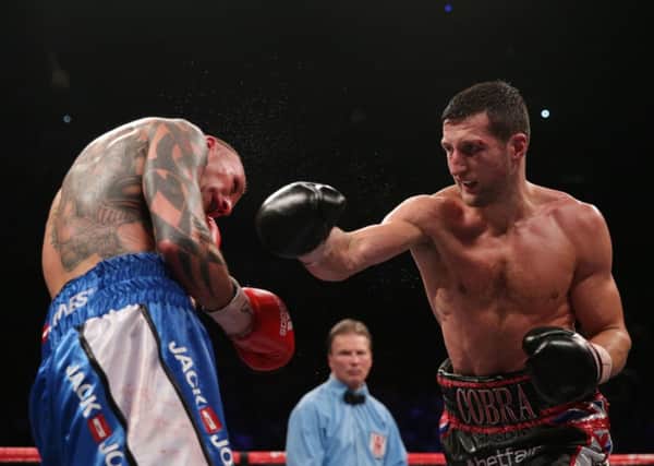 Carl Froch in action (just out of shot are lots of people chanting 'Fight! Fight! Fight!') - photo courtesy of PA Wire..