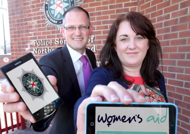 Sharon Burnett of Causeway Womens Aid with Inspector Bob Blemmings of the PSNI Public Protection Unit. INCR24-14S