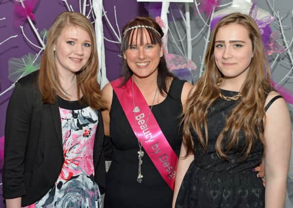 Jordan Scott (left) is pictured with Victoria and Janeen Fee at the Beauty by Design womens conference in the Jordan Victory Church. INCT 23-013-PSB