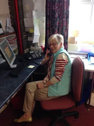 Dorothy Moore pictured at her former desk at the Country Medical Centre, Armoy. INBM24-14 S
