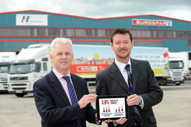 Paddy Doody, Sales and Marketing Director and Ron Whitten, Group Finance Director at the Henderson Group have welcomed the company's record turnover figures. INNT 24-507CON