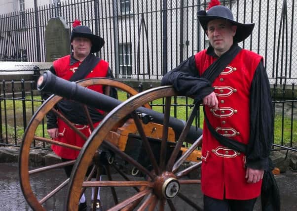 Two of the Apprentices in period costume who paraded through Londonderry with gun carriages, which were taken onto the City Walls.