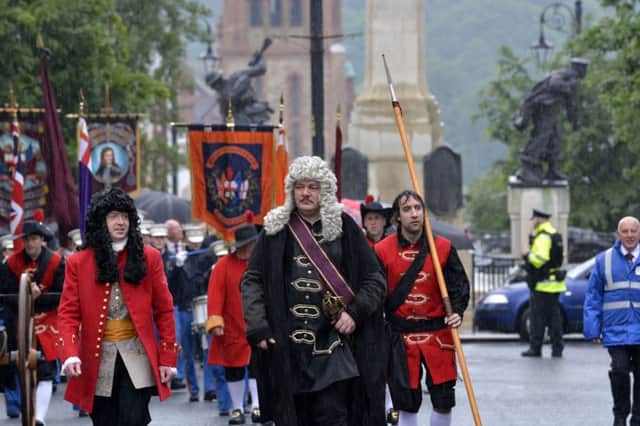 David Donnell (Henry Baker) and Billy Stewart (Governor Walker) pictured at the head of Saturday's parade. INLS2314-167KM