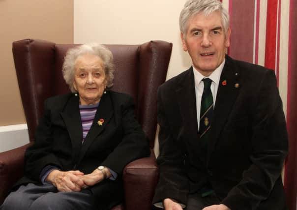 Pictured is Mrs Doreen Flack with the present Cookstown RBL PAO Trevor Carson.