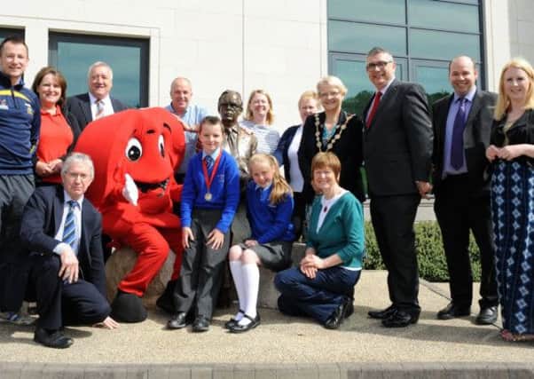 Pictured at the lauch of Lisburn as Northern Ireland's first Heart City with the British Heart Foundation and pictured at the statue of the late Professor Pantridge,  inventor of the mobile defibrillator is the Mayor, Councillor Margaret Tolerton;  Gary Wilson, Fundraising Volunteer Manager of BHF Northern Ireland; Elected Members; BHF representatives; guests and local school children.