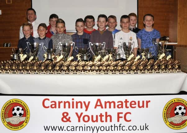 Carniny Youth Under 12s with manager Jason Hunter at the clubs Prize Evening.
