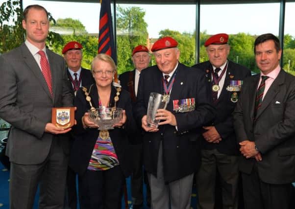 At a recent reception to mark the 54th Anniversary of the Royal Military Police in Lisburn are (l-r): 
Captain Michael Boyde; John Walker; the Mayor of Lisburn, Councillor Margaret Tolerton; Mr Michael McMahon; Lt Colonel (retired) Glen Murray; Ray Spence and Lt Colonel Nic Ilic
.