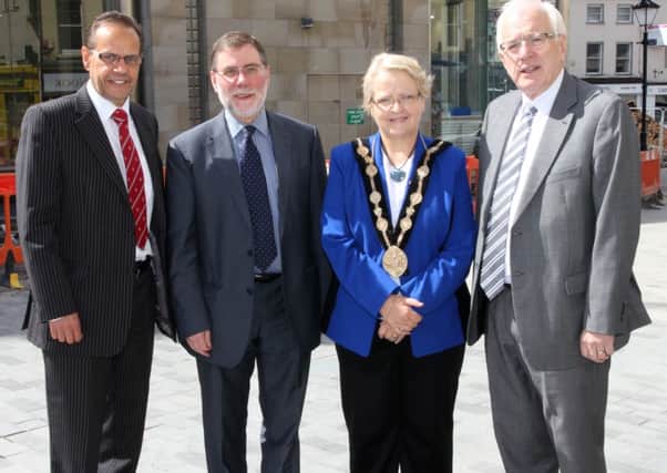 David McCallum, Chairman, Lisburn City Centre Management, Nelson McCausland, Minister for Social Development, Councillor Margaret Tollerton, Mayor of Lisburnand Aldreman Allan Ewart, Chairman, Economic Development Committee at Lisburn City  Council during a visit by Minister McCausland to view the ongoing public realm works in Lisburn City Centre.