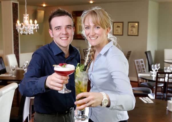 Matthew Stewart and Jenny Maguire raising a glass to restaurant week, at The Wallace restaurant, Lisburn. Picture: Cliff Donaldson