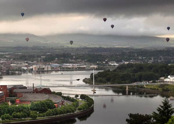 Hot air balloons in the sky above Derry city on Friday at 6.30am, the longest day of the year, each equiped with its own' Sky Orchestra' sound system, created by Luke Jerram for Music City day in the UK City of Culture. Picture Margaret McLaughlin © by-line 21-6-13 see news stories