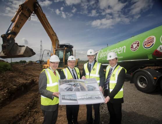 Roads Minister Danny Kennedy, Robert Etchingham, Chief Executive Officer for Applegreen, Environment Minister Mark H Durkan and Petrogas Global Limited Director Eugene Moore oversee the start of work on the new Applegreen motorway services between Sandyknowes and Templepatrick. INNT 25-501CON