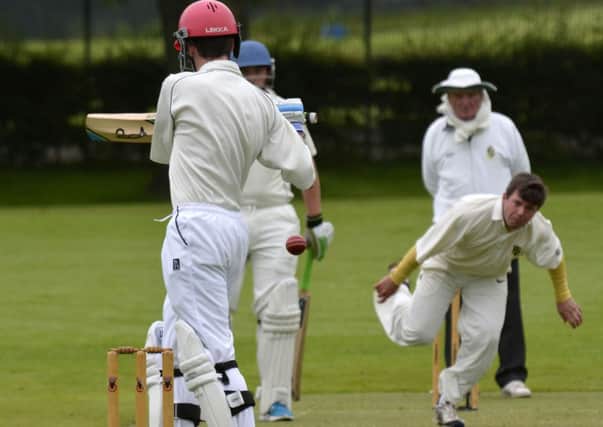 Strabane second's batsman Tony Gallagher gets out of the way of this ball from Newbuildings bowler Graham Robb. INLS2414-141KM