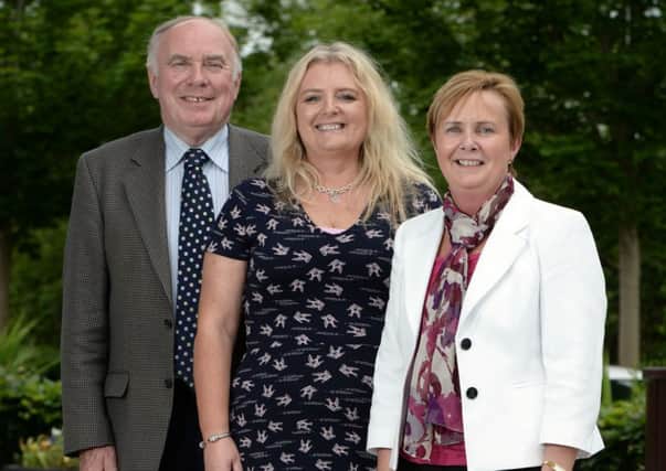 Deputy Presiding Councillor Mervyn Rea, Presiding Councillor Mandy Girvan and chief executive Jacqui Dixon pictured after the inaugural meeting of the new Antrim and Newtownabbey Council at Antrim Civic Centre on June 12. Pic by Charles McQuillan