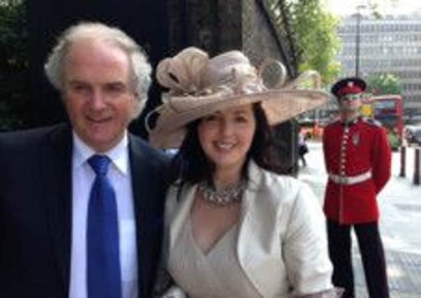 Gary and Margo Kennedy at the Queen's Garden Party last year. Mr Kennedy will be seeing her Majesty again to receive his MBE.