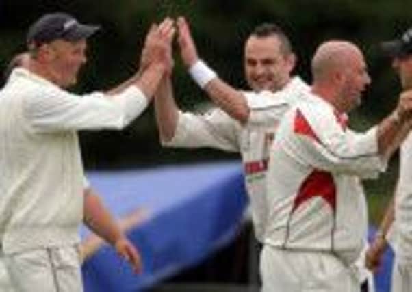 Bonds Glen Seconds players celebrate after taking the wicket of Ardmore Seconds batsman Paul Brolly.