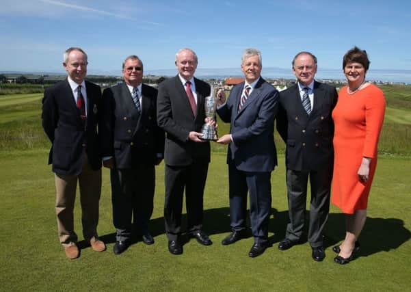 First Minister Peter Robinson, deputy First Minister Martin McGuinness and Enterprise, Trade and Investment Minister, Arlene Foster have announced that Royal Portrush Golf Club has been invited to join the rota to host The Open Championship. Pictured with the Ministers are left to right: Simon Rankin, Captain, Royal Portrush Golf Club; Peter Unsworth, Chairman, The R&A Championship Committee and Peter Dawson, Chief Executive, The R&A. Picture by Kelvin Boyes/Press Eye