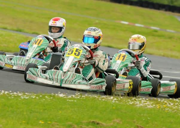 Annahilt driver Daniel Harper (centre) battling it out with Jack McGaughey from Glenavy and Coleraine's Sam McDonnell.