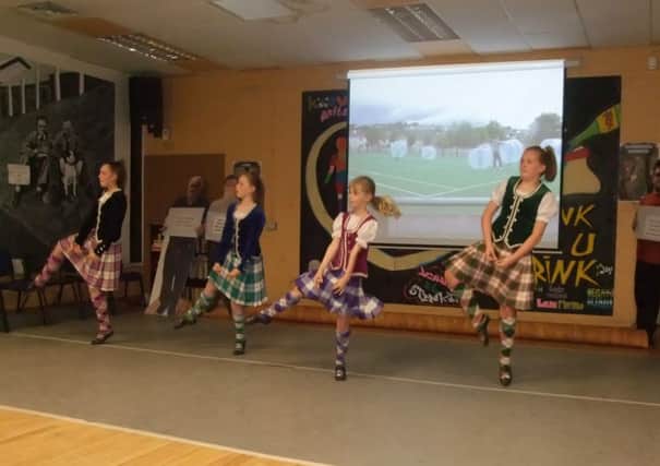 Dancers from the Sollus School of Highland Dance performing in the Glen during Community Relations Week.