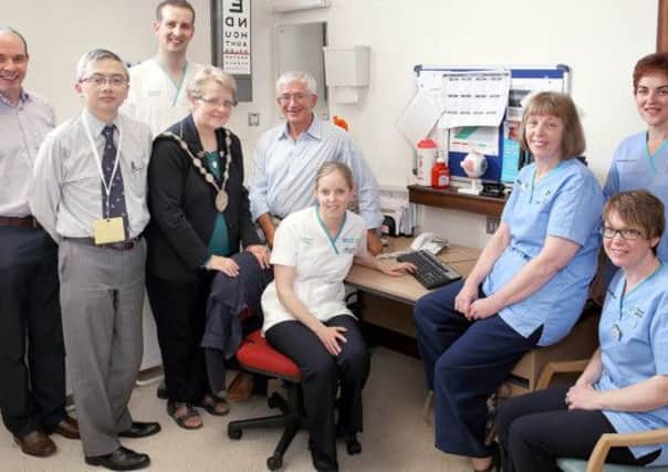 Pictured at the diabetes unit at Lagan Valley Hospital are, from left, Thomas McCall, Simon Au, Richard Henry, Mayor Margaret Tolerton, Kieran Walshe, Claire McMullan, Hilda Francey, Sylvia Boyle and Valerie Millar. US1425-502cd Picture: Cliff Donaldson