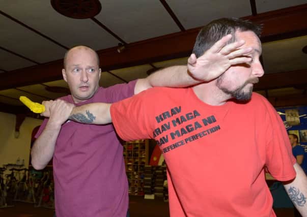 Unarming an opponent at the Krav Maga defence course. INLT 20-304-PR