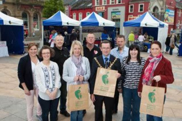 Mayor of Coleraine, Councillor George Duddy with Coleraine Borough Councils Causeway Speciality Market Working Group, Julienne Elliott, Louise Pollock, Joanne Allen, Hamish Grant, Peter Coulter, Mary McKinney and Patricia OBrien pictured at the recent Causeway Speciality Market day outside Coleraine Town Hall. INCR26-116S