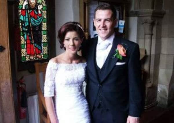Amanda and David Scanlon pictured on their wedding day last year.