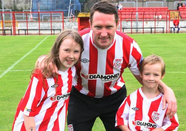 Barry Molloy pictured with his two children, Ellie (6) and Rossa (5) before the start of Sunday's Testimonial at the Brandywell against a James McClean Select. DER2514MC132