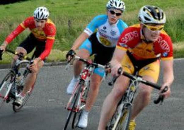 East Tyrone junior rider Harvey Barnes,centre, held off the challenge from the two Omagh Wheelers riders to win the Inter league race. Pic: Alan Donnelly.