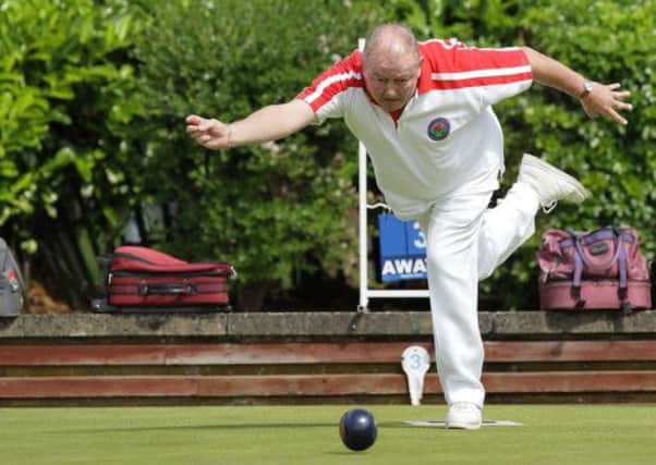 Gary Stubbs bowling for Lagan Valley against Portadown B. US1426-554cd Picture: Cliff Donaldson