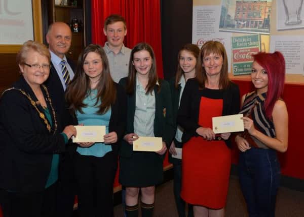 The successful recipients of the 2014 Coca Cola Bursary Scheme are pictured with the Mayor of Lisburn, Councillor Margaret Tolerton; Mr Jim Rose, Director of Leisure Services and Ms Ailish Forde, Public Affairs & Communications Director, Coca Cola.