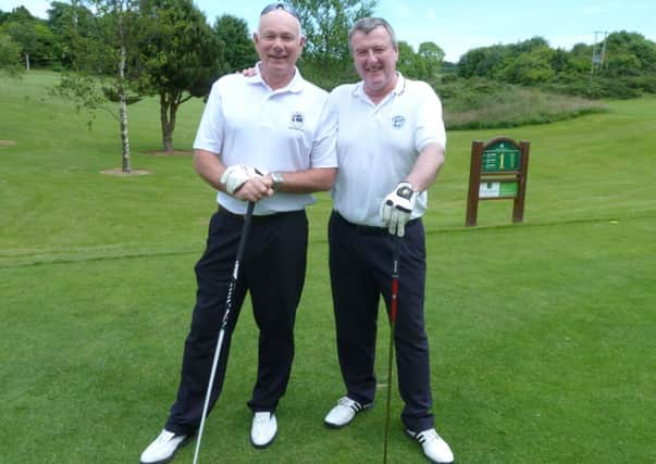 Rockmount Club Captain Paul Banford and Peter O'Hara on the first tee before their Sam Rutherford match.