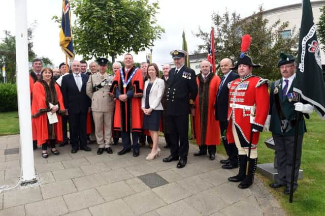 Civic and Military representatives who took part in the Armed Forces Flag Raising Ceremony at Lagan Valley Island.