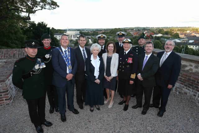 Pictured in Castle Gardens at the musical concert are: (l-r) Lieutenant Colonel Nick Ilic, Station Commander at Thiepval Barracks; Colonel Mike Murdoch, Deputy Commander at Thiepval Barracks; the Deputy Mayor of Lisburn, Councillor Andrew Ewing; Edwin Poots MLA; the Lord Lieutenant of County Antrim Mrs Joan Christie OBE; Commander Ian Allen, HMS Hibernia; Dr Theresa Donaldson, Chief Executive Designate of Lisburn City and Castlereagh District Council; Lieutenant Colonel Kerry Anderson, HMS Hibernia; Dame Mary Peters DBE, Honorary Captain of HMS Hibernia; Bandmaster WO1 Richard Douglas; the Rt Hon Jeffrey Donaldson MP and Mr Colin McClintock, Acting Chief Executive, Lisburn City Council.
