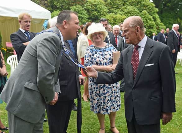 HRH The Duke of Edinburgh pictured with the Deputy Mayor of Lisburn Andrew Ewing at a Garden Party in Hillsborough Castle. This was the last of the official engagements on day two of the Royal visit. Photo by Simon Graham/Harrison Photography