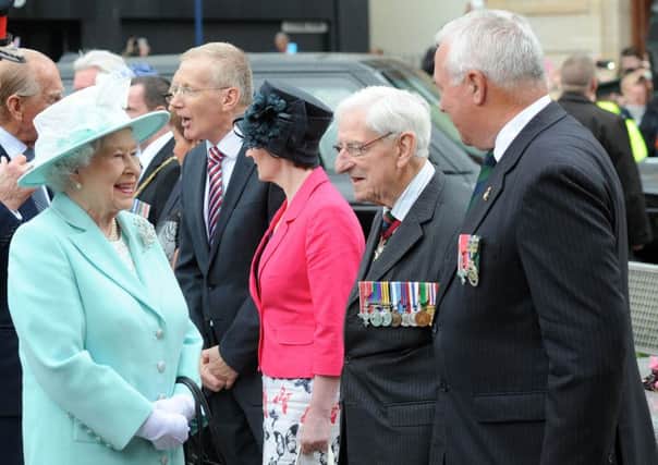 PACEMAKER, BELFAST, 25/6/2014: The Queen meets Major General David O'Morchoe, the President of the Royal British Legion in the Republic of Ireland,and Colonel Mervyn Elder, the President of the RBL in Northern Ireland during the royal visit to Coleraine today. The Queen and the Duke of Edinburgh met members of the Royal British Legion from Northern Ireland and the Republic during her visit to Coleraine today.
The event marked the start of the First World War and brought together members of the RBL from Northern Ireland and the Republic.
PICTURE BY STEPHEN DAVISON