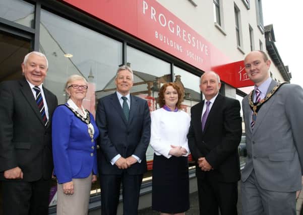 First Minister Peter Robinson, who officially opened the newly refurbished branch of the Progressive Building Society, is pictured with (from left) John Trethowan (Board Chairman), Mayor of Ballymena, Cllr. Audrey Wales, Darina Armstrong (Chief Executive), William Burgess (Branch Manager) and Alan Stewart (President Chamber of Commerce). INBT27-225AC