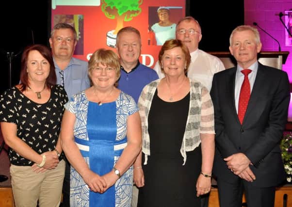 The Board of Governors of Straid Primary School showing their appreciation for Mrs Florence Mairs at her retirement evening.  INCT 26-135-GR