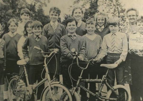 Pupils of Coagh Primary School who were successful in 1989 in gaining their Cycling Proficiency Certificates. Included are Mrs C. Booth, vice-principal, and Mrs C. McVitty, who coached the pupils.