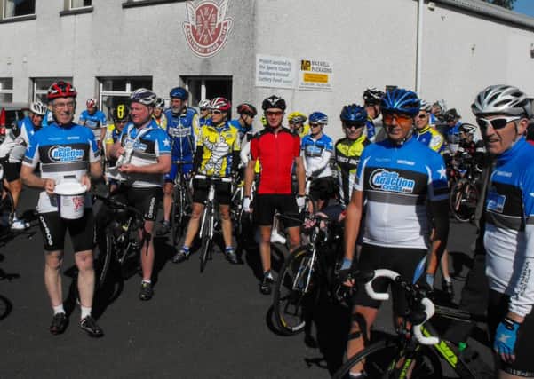 Ballymena RC - Chain Reaction Cycles - Chairman John Maxwell collects donations for the NI Children's Hospice prior to Saturday's charity cycle ride.