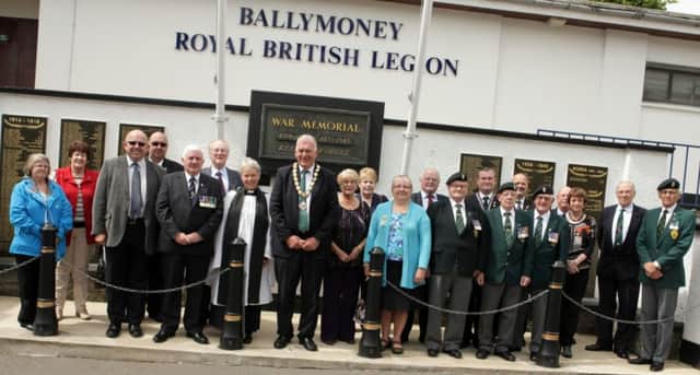 REMEMBER. Mayor Cllr Bill Kennedy, pictured along with Chaplain Rev Frances Bach, ex Servicemen and members of the RBL at a Wreath laying ceremony to mark Armed Forces Day on Saturday.INBM27-14 112SC.