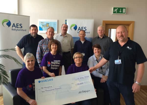 Alice Crum, Roma Brown & Davina Adair from the Larne Hospice Support Group being presented with a cheque for £10K from the Joint Committee for Social Responsibility at AES NI  (William Hamilton, David Simms, Dave Bothwell, Ian Mulholland, Dermot McCloskey, Denise Savage & Ray Curry). INLT-27-700-con