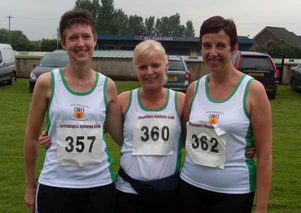 County Antrim Harriers' Carol Annesley, Paula McMaster and Joanne Hughes at the Run Round the Bridges 10-mile race at Limavady. INLT 27-923-CON