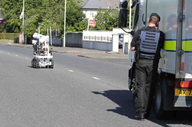 Army bomb experts at a scene on the Ballymena Road in Ballymoney early this morning  after a device was discovered. It is beleived to be a pipe bomb.PICTURE MARK JAMIESON.