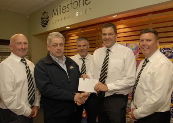 Tom McAvoy, Proprietor of the Milestone Supermarket, Rathfriland, who has signed a two year sponsorship deal as the main sponsor of Rathfriland Football Club. Included are from left, Mervyn Groves, assistant Commercial Manager, Eric Annett, PRO, John Annett. Treasuer and Mark Bickerstaff, Vice-Chairman.  © Photo: Gary Gardiner. IN BL WK 2714-513.