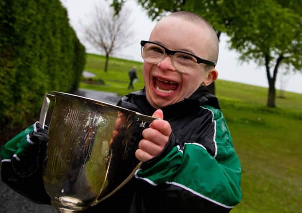 Jay Beatty pictured with the Division 3 trophy which was won by Celtic Club (Lurgan Number 1). INLM21-703.
