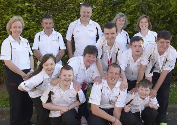 Banbridge Special Olympians Josh Macauley (Gold), Liam Ross (Silver), Emma Higgins (Gold), David Ochiltree (Bronze), Denise Fegan(Silver), Nicholas Grant (6th in Bocce), Mark Blevins (4th), Stefan McGrath (Silver) and Philip Patton (Silver)  returned from the Special Olympics Ireland Games 2014 in Limerick with a haul of medals and ribbons, included are  Coach's Joan Ross, Charmain Patton, Thomas Patton, Claire Gribben and Anthony McGrath © Edward Byrne Photography INBL1425-218EB